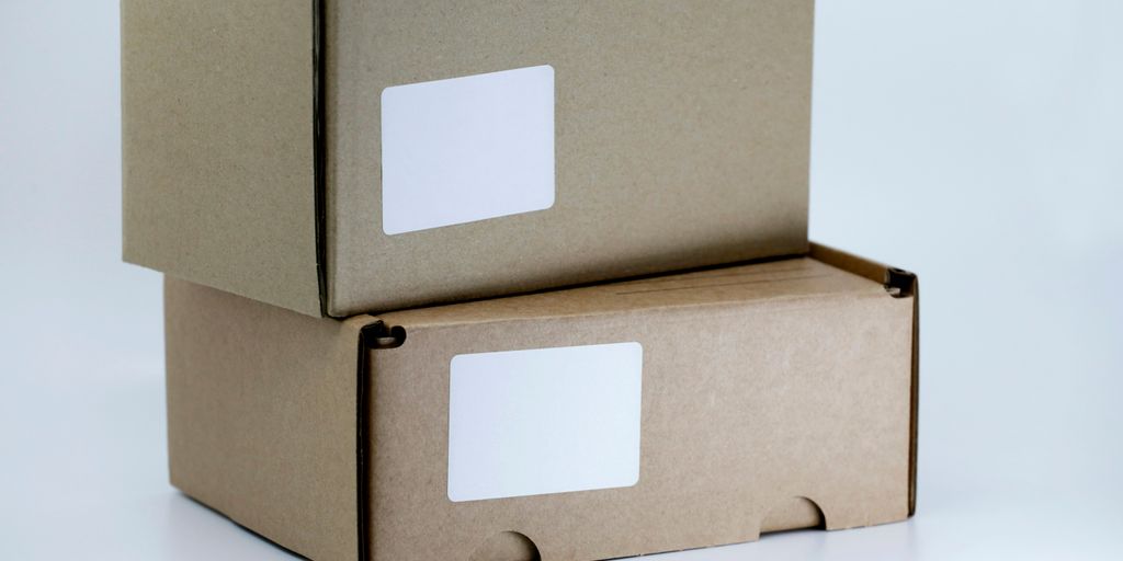 brown cardboard box on white table