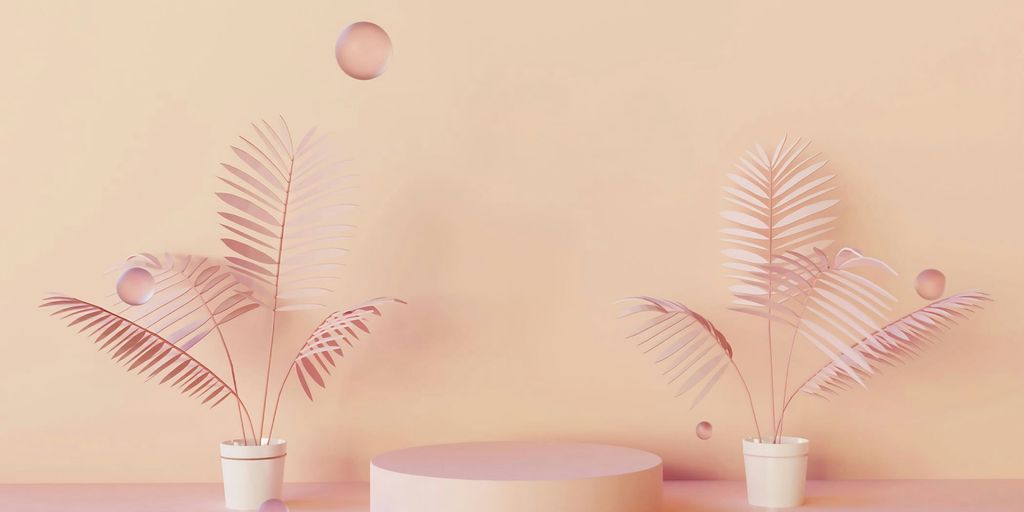 a group of small white bowls with pink flowers in them